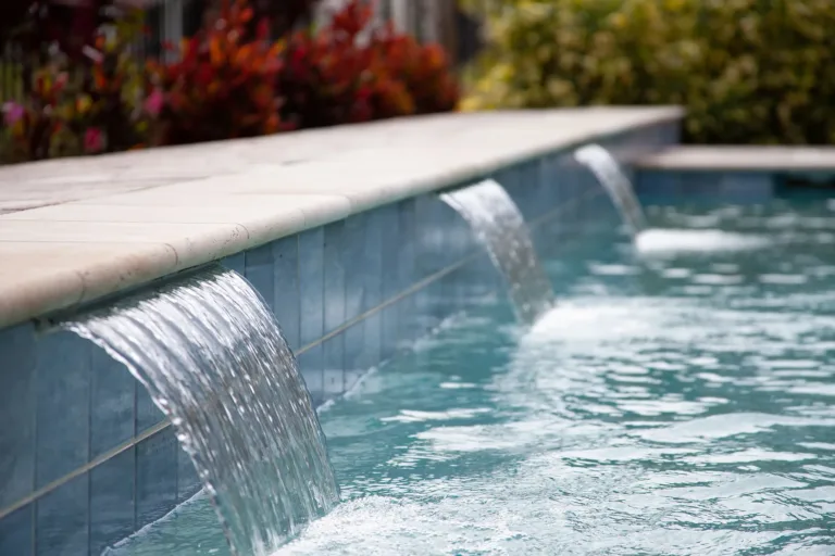 Close-up of sheer descent water features into a pool